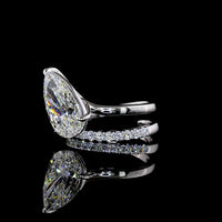 18K White Gold Pear Shape Solitaire Diamond Shank Ring with Inclined Center and Accent Stones - 5.49 Carats Total Diamond Weight (5.04 Carats Center F VS1, 0.45 Carats Side E VS1) - Covaloro Fine Jewelry