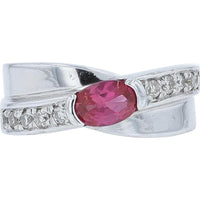 18K White Gold Ring with 0.55 Carat Oval Ruby and 0.20 Carat Round Diamond Accents