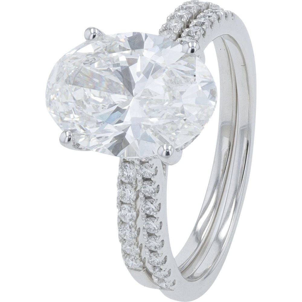 18K White Gold Split Shank Bridal Set with 4.00 Carat Oval Lab Grown Diamond and Accent Stones - 4.50 Carat Total Diamond Weight