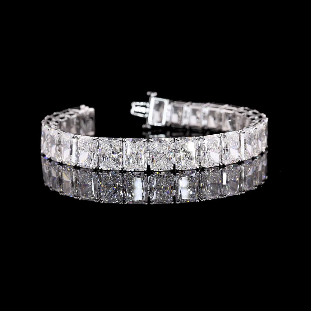 18K White Gold Tennis Bracelet with 26 Prong-Set Radiant Cut Lab Diamonds - 53.79 Carat Total Weight, E-F Color VS2 Clarity - Covaloro Fine Jewelry