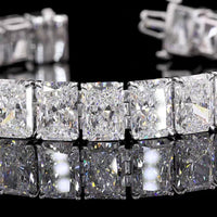 18K White Gold Tennis Bracelet with 26 Prong-Set Radiant Cut Lab Diamonds - 53.79 Carat Total Weight, E-F Color VS2 Clarity - Covaloro Fine Jewelry