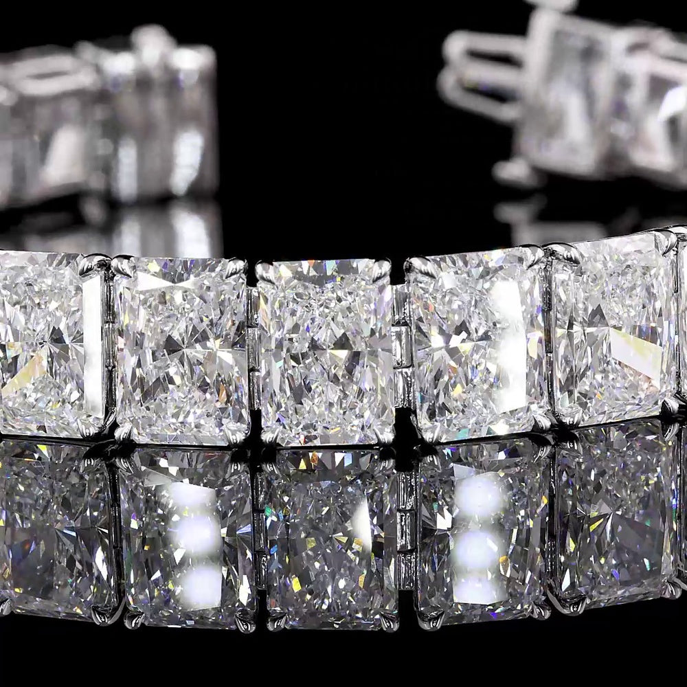 18K White Gold Tennis Bracelet with 26 Prong-Set Radiant Cut Lab Diamonds - 53.79 Carat Total Weight, E-F Color VS2 Clarity - Covaloro Fine Jewelry