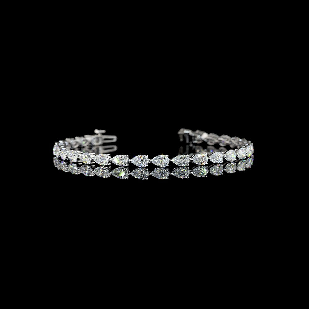18K White Gold Tennis Bracelet with East-West Pear Shaped Lab Diamonds - 6.41 Carat Total Weight, E-F Color VS1 Clarity - Covaloro Fine Jewelry