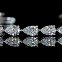 18K White Gold Tennis Bracelet with East-West Pear Shaped Lab Diamonds - 6.41 Carat Total Weight, E-F Color VS1 Clarity - Covaloro Fine Jewelry