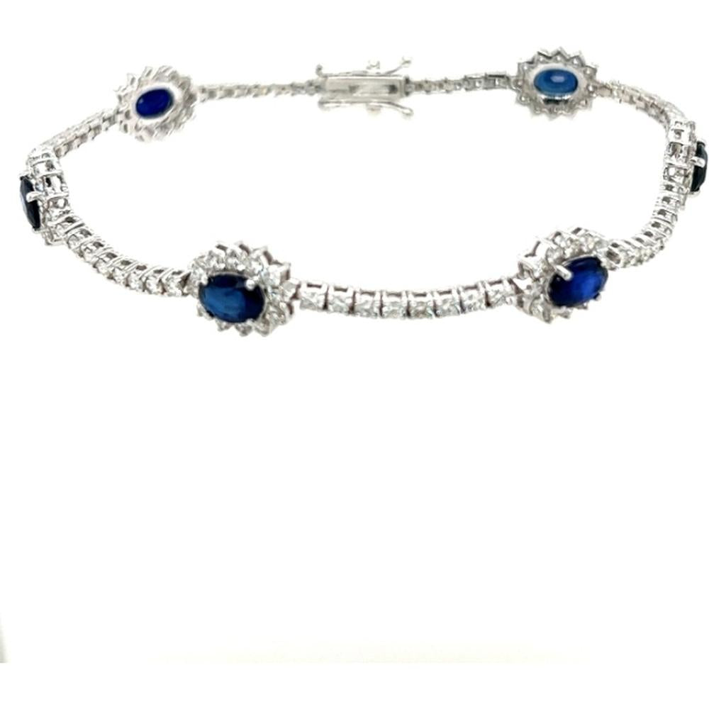 18K White Gold Tennis Bracelet with Oval Blue Sapphires and Diamond Halo Stations by Afarin