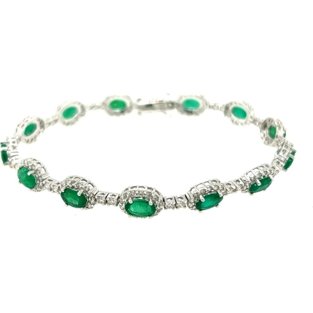 18K White Gold Tennis Bracelet with Oval Emeralds and Diamond Halo Accents by Afarin