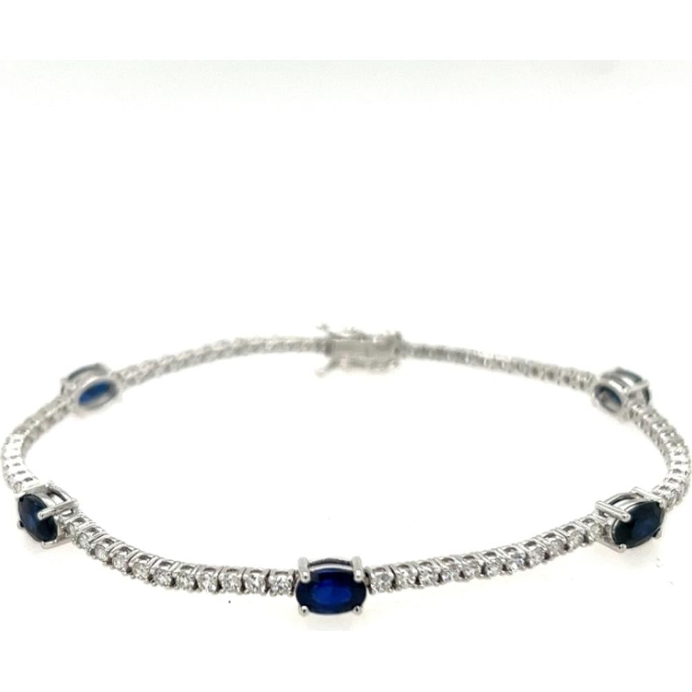 18K White Gold Tennis Bracelet with Prong-Set Oval Blue Sapphires and Diamonds by Afarin