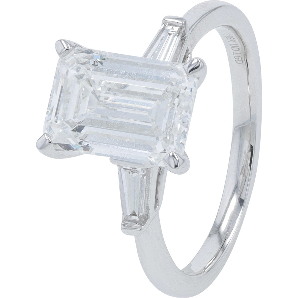 18K White Gold Three-Stone Engagement Ring with 3.00 Carat Emerald Cut Lab Grown Diamond and Tapered Baguette Side Stones - 3.25 Carat Total Diamond Weight