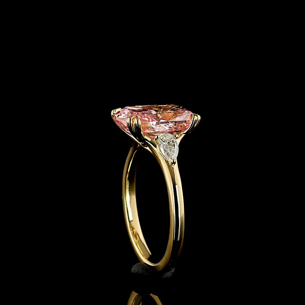 18K Yellow Gold 3-Stone Ring with Cushion Modified Cut Fancy Vivid Pink Lab Diamond and Pear Shape Diamonds - 4.44 Carats Total Diamond Weight - Covaloro Fine Jewelry