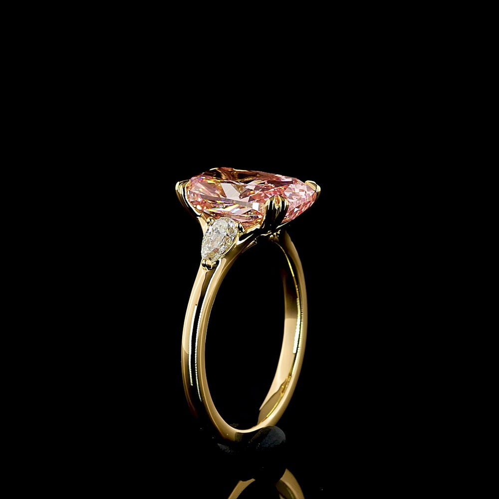 18K Yellow Gold 3-Stone Ring with Cushion Modified Cut Fancy Vivid Pink Lab Diamond and Pear Shape Diamonds - 4.44 Carats Total Diamond Weight - Covaloro Fine Jewelry