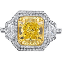 18K Yellow Gold & Platinum 3-Stone Ring with GIA-Certified 3.26 Carats Fancy Vivid Yellow Radiant Diamond and 1.03 Carats Total Side and Halo Diamonds