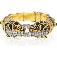 18K Yellow Gold & Platinum Cuff Bracelet with Diamond Ring Clasp and Black Enamel Lion Heads Featuring Sapphire Eyes - Designed by David Webb