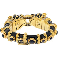 18K Yellow Gold & Platinum Cuff Bracelet with Diamond Ring Clasp and Black Enamel Lion Heads Featuring Sapphire Eyes - Designed by David Webb