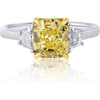 18K Yellow Gold & Platinum Three Stone Ring with 2.02 Carat GIA Fancy Intense Yellow Radiant Cut Diamond and 0.40 Carat Trapezoid Side Diamonds