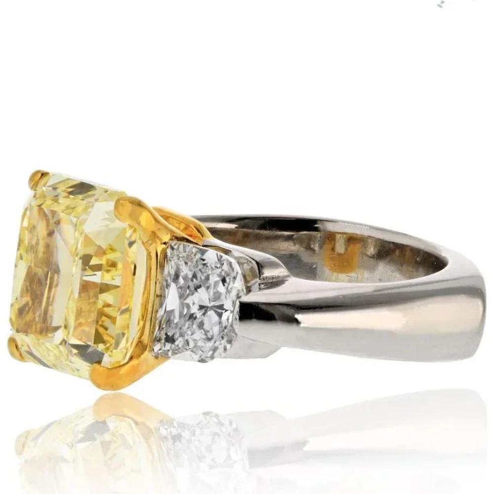 18K Yellow Gold & Platinum Three-Stone Ring with 7.20 Carats Radiant Fancy Intense Yellow Diamond and 1.81 Carats Half-Moon White Diamonds