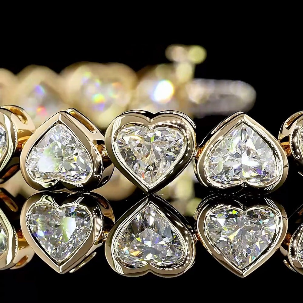 18K Yellow Gold Heart Shaped Diamond Tennis Bracelet with Bezel Set Lab Grown Diamonds - 14.10 Total Carat Weight - Covaloro Fine Jewelry