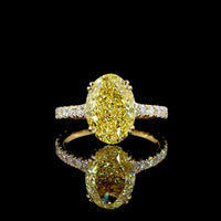18K Yellow Gold Oval Cut Fancy Vivid Yellow Diamond Solitaire Shank Ring - 4.84 Carat Total Diamond Weight with 18 Round Brilliant Accents - Covaloro Fine Jewelry