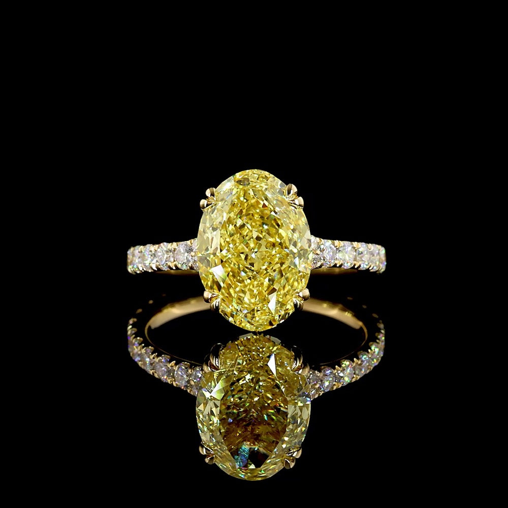 18K Yellow Gold Oval Cut Fancy Vivid Yellow Diamond Solitaire Shank Ring - 4.84 Carat Total Diamond Weight with 18 Round Brilliant Accents - Covaloro Fine Jewelry