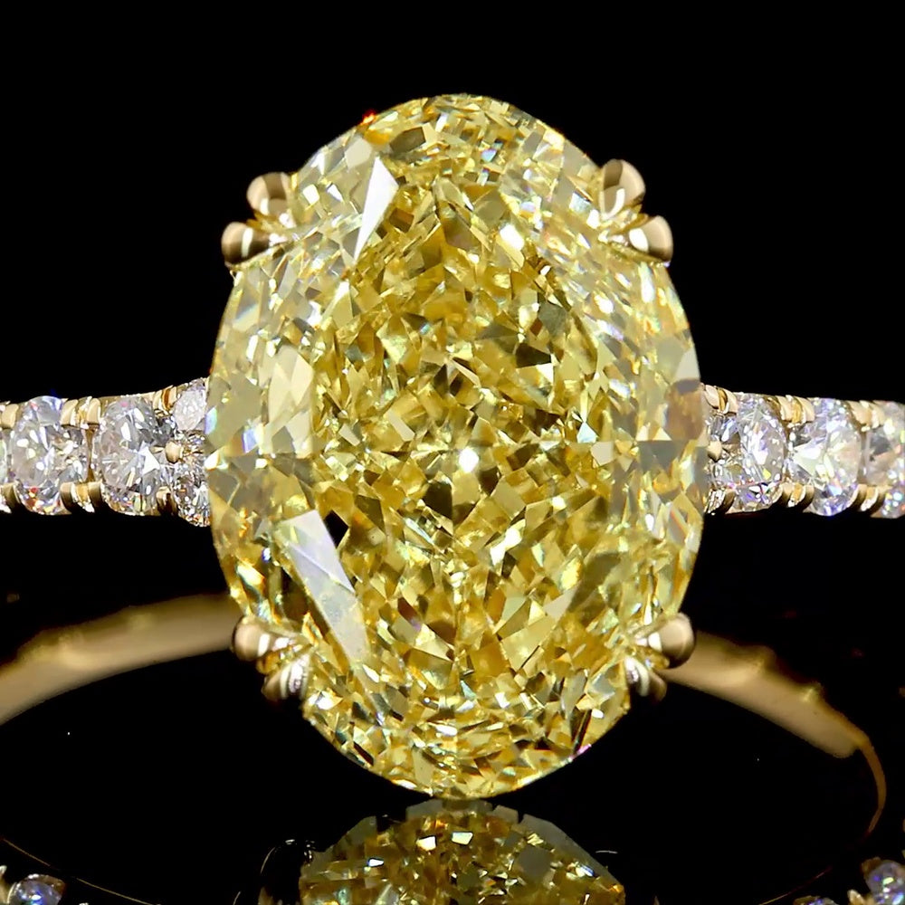 18K Yellow Gold Oval Cut Fancy Vivid Yellow Diamond Solitaire Shank Ring - 4.84 Carat Total Diamond Weight with 18 Round Brilliant Accents - Covaloro Fine Jewelry