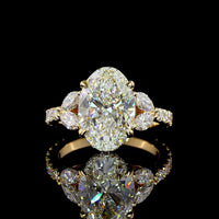 18K Yellow Gold Oval Cut Hidden Halo Ring with Marquise and Round Lab Diamonds - 4.01 Carat Center Stone, 5.07 Total Carat Weight - Covaloro Fine Jewelry