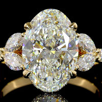 18K Yellow Gold Oval Cut Hidden Halo Ring with Marquise and Round Lab Diamonds - 4.01 Carat Center Stone, 5.07 Total Carat Weight - Covaloro Fine Jewelry