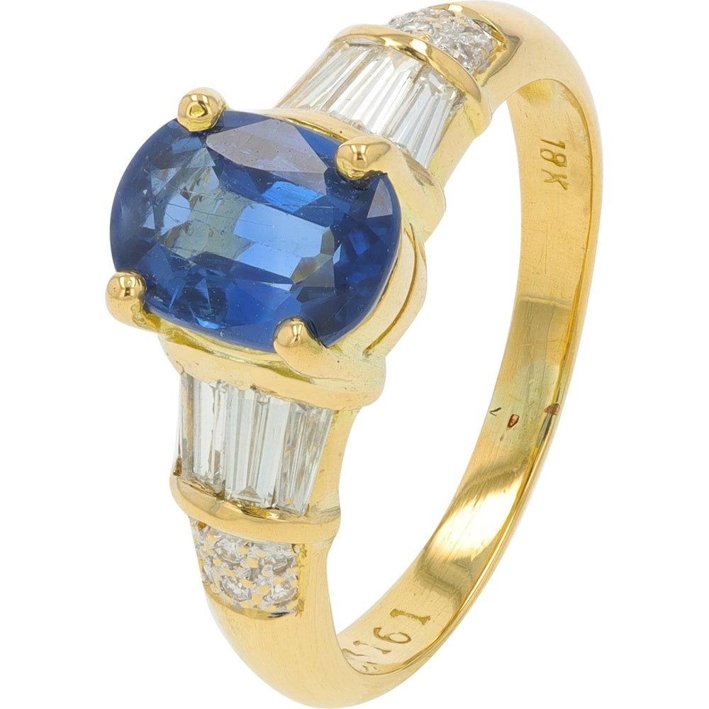 18K Yellow Gold Oval Sapphire Ring with Baguette Diamond Side Stones - 1.31 Carat Total Sapphire Weight and 0.61 Carat Total Diamond Weight
