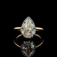 18K Yellow Gold Pear Shape Solitaire Ring with Black Rhodium Bezel and Prong Setting - 2.69 Carat IGI Certified Lab Grown Diamond E VVS2 - Covaloro Fine Jewelry