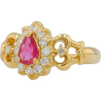 18K Yellow Gold Ring with 0.40 Carat Pear - Shaped Ruby and 0.20 Carat Diamond Halo