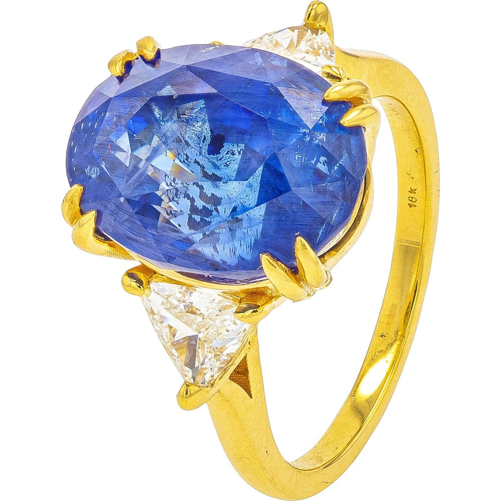 18K Yellow Gold Ring with 11.61 Carat Oval Sapphire and Trillion-Cut Diamond Side Stones - 0.72 Carat Total Diamond Weight