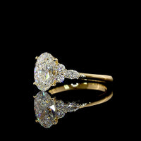 18K Yellow Gold Special Ring with 2.02 Carat Oval Cut Lab Diamond and Marquise and Round Side Stones - 2.43 Carat Total Diamond Weight - Covaloro Fine Jewelry