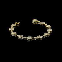 18K Yellow Gold Station Bracelet with 7.59 Carat Lab Grown Brilliant Cut Diamonds in Bezel and Floral Motif Settings - Covaloro Fine Jewelry