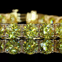 18K Yellow Gold Tennis Bracelet with 28 Round Brilliant Cut Fancy Vivid Yellow Lab Diamonds - 29.68 Carat Total Weight - Covaloro Fine Jewelry