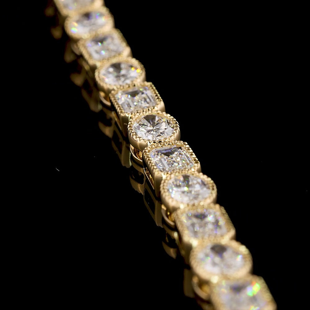 18K Yellow Gold Tennis Bracelet with East-West Bezel Set Emerald and Oval Cut Lab Diamonds - 7.80 Carats Total Diamond Weight - Covaloro Fine Jewelry