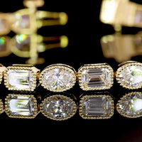 18K Yellow Gold Tennis Bracelet with East-West Bezel Set Emerald and Oval Cut Lab Diamonds - 7.80 Carats Total Diamond Weight - Covaloro Fine Jewelry