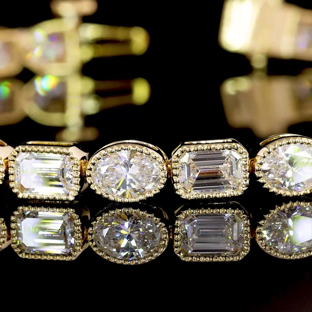 18K Yellow Gold Tennis Bracelet with East-West Bezel Set Emerald and Oval Cut Lab Diamonds - 7.80 Carats Total Diamond Weight - Covaloro Fine Jewelry