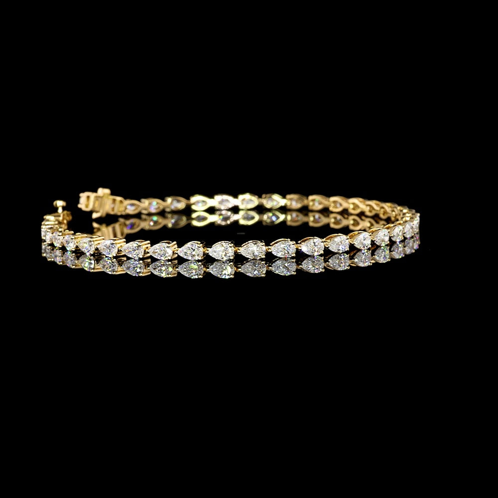 18K Yellow Gold Tennis Bracelet with East-West Set Pear Shaped Lab Diamonds - 3.85 Carats Total Weight, E-F Color, VS Clarity - Covaloro Fine Jewelry