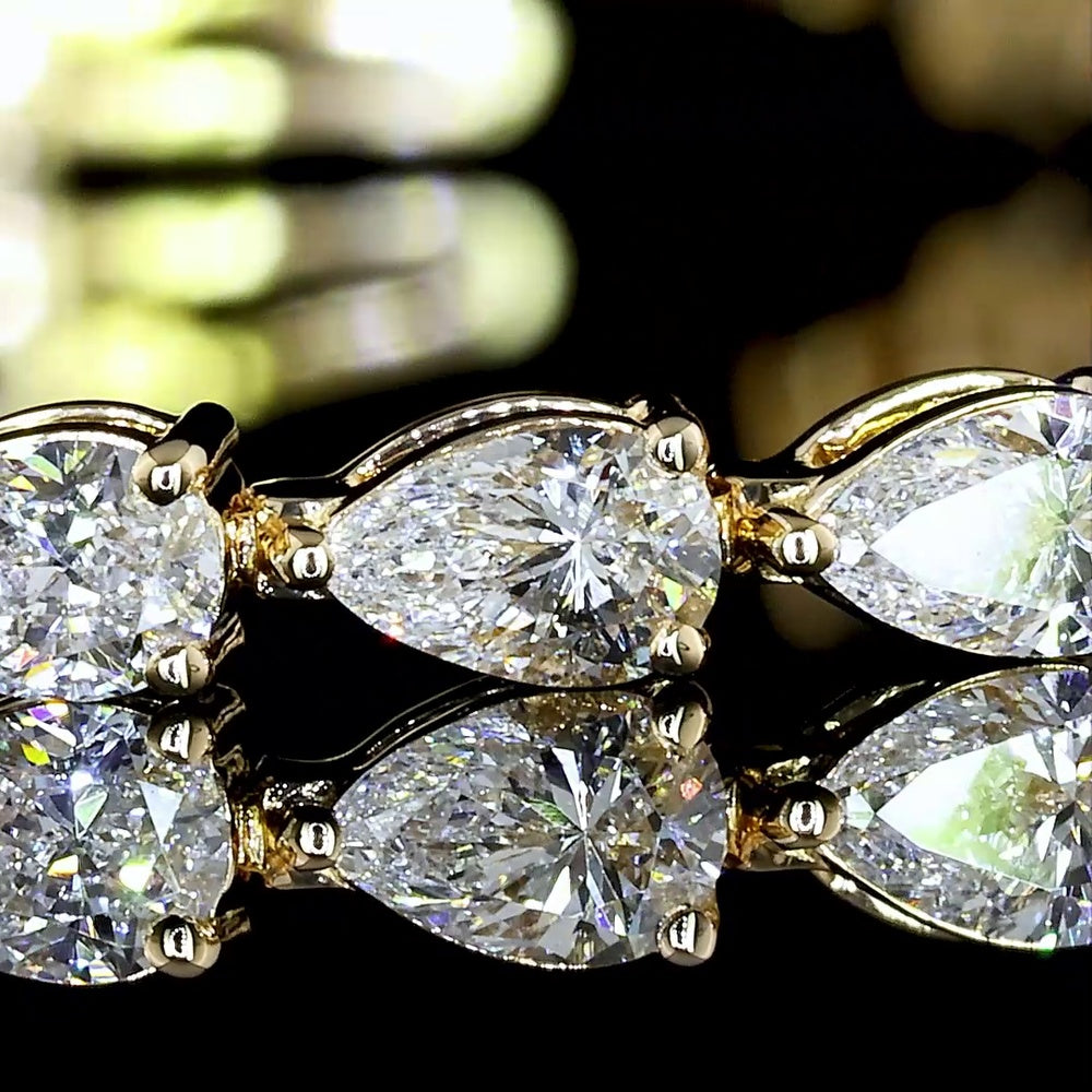 18K Yellow Gold Tennis Bracelet with East-West Set Pear Shaped Lab Diamonds - 3.85 Carats Total Weight, E-F Color, VS Clarity - Covaloro Fine Jewelry