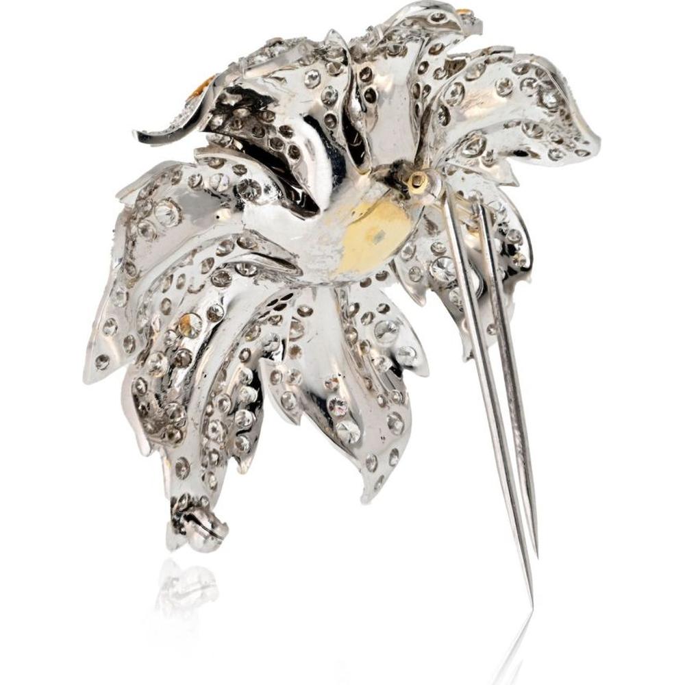 1970s Platinum & 18K Yellow Gold Flower Brooch with 25.00 Carats Round Brilliant Cut Diamonds