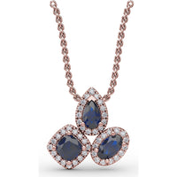 Abstract Three-Stone Pendant with Pear, Cushion, and Oval Blue Sapphires and Pavé Diamond Halos by Fana - 1.04 Carat Total Gemstone Weight