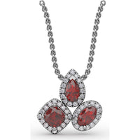 Abstract Three-Stone Ruby and Pavé Diamond Halo Pendant by Fana - 1.04 Carat Total Gemstone Weight
