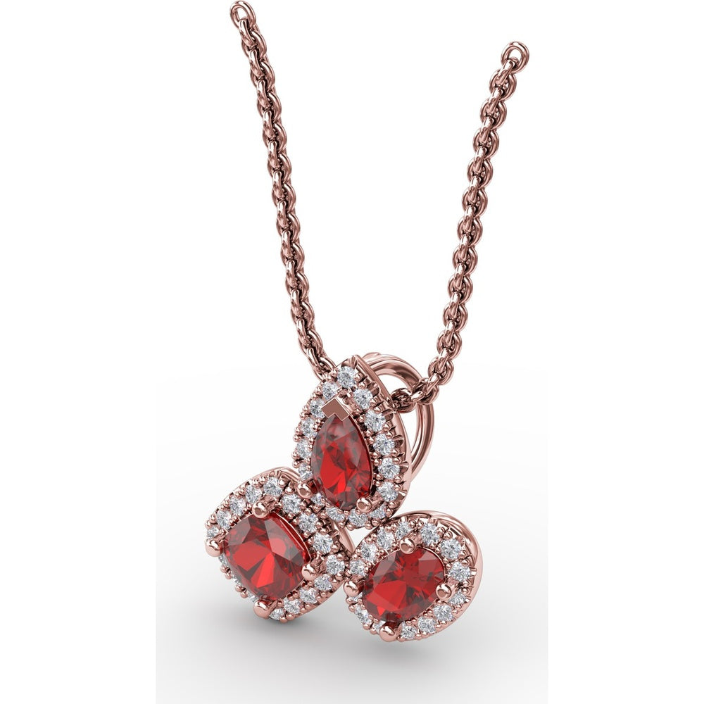 Abstract Three-Stone Ruby and Pavé Diamond Halo Pendant by Fana - 1.04 Carat Total Gemstone Weight
