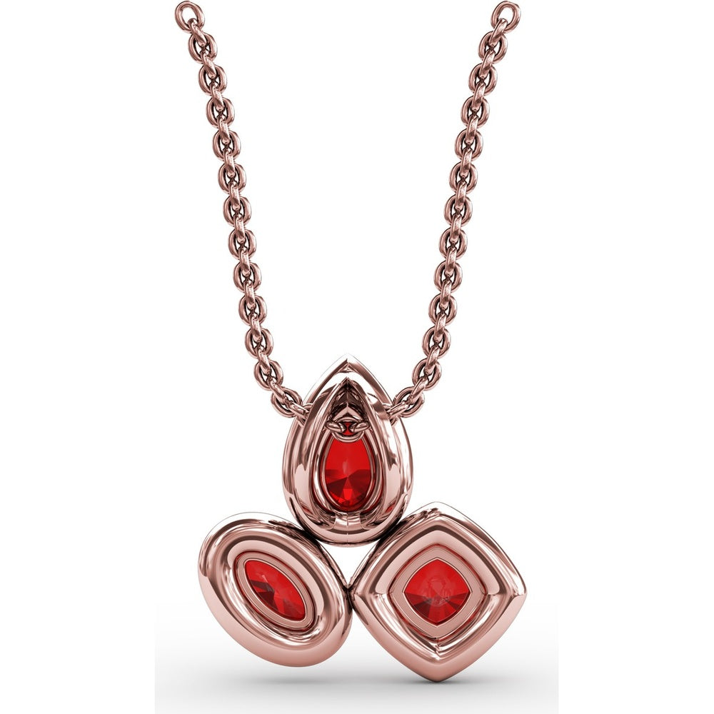 Abstract Three-Stone Ruby and Pavé Diamond Halo Pendant by Fana - 1.04 Carat Total Gemstone Weight
