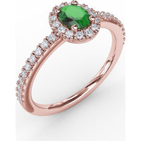 Classic Halo Ring with Oval Emerald and Pavé Set Round Diamonds by Fana - 0.52 Carat Total Gemstone Weight