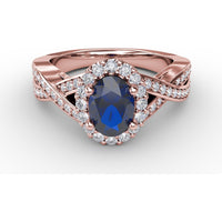 Criss-Cross Ring with Oval Sapphire and Pavé Diamond Halo by Fana - 1.69 Carat Total Gemstone Weight