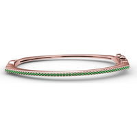 Cutting Edge Bangle with Prong Set Round Emeralds and Pavé Diamond Accent by Fana - 0.74 Carat Total Gemstone Weight