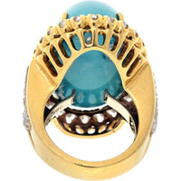 David Webb Platinum & 18K Yellow Gold Ring with Oval Cabochon Turquoise and Diamond Halo