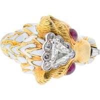 David Webb Platinum & 18K Yellow Gold White Enamel Lion Ring with 0.72 Carat Trilliant Diamond and Cabochon Rubies