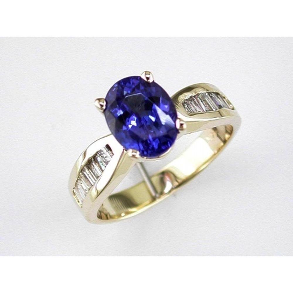 Dazzling 14K Yellow Gold Tanzanite & Diamond Halo Ring
