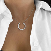 Diamond and Blue Sapphire Horseshoe Necklace in 18K White Gold by Charles Krypell