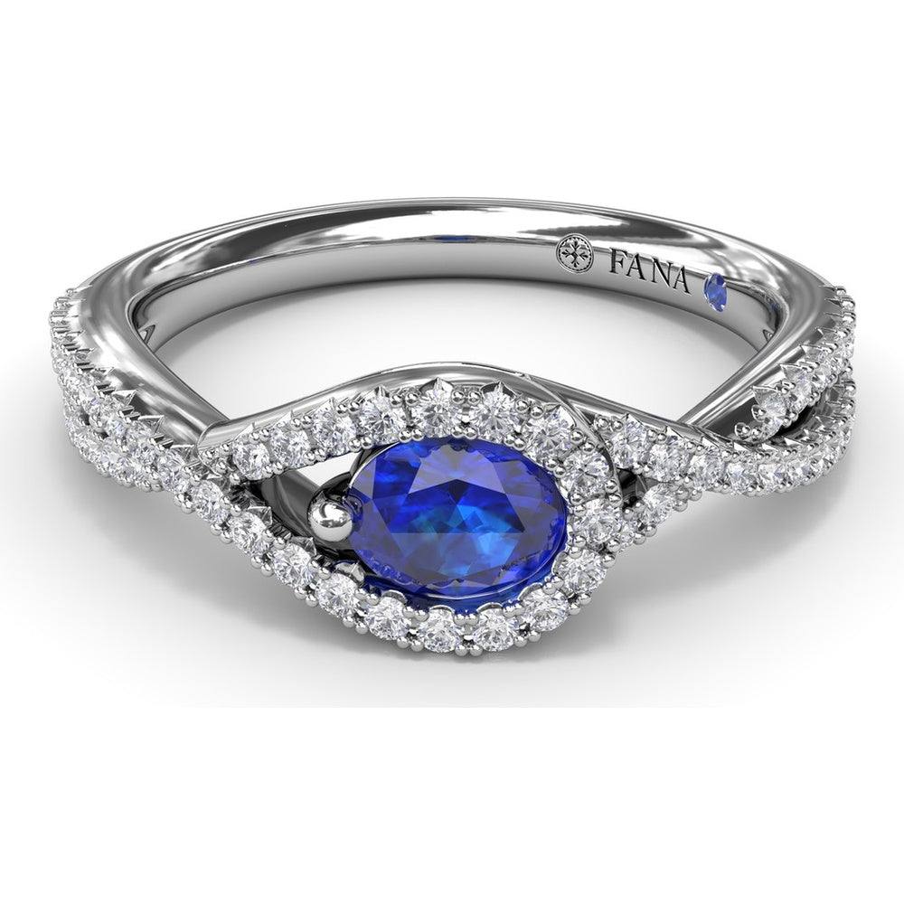 East-to-West Oval Sapphire Ring with Diamond Halo and Split Shank by Fana - 0.87 Carat Total Gemstone Weight